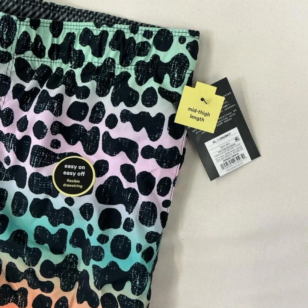 New with tags boys' swim shorts / swim trunks.‎